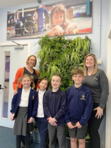 Trime UK's "Living Wall" of live green plants has been delivered to a local primary school, Godmanchester Community Academy.