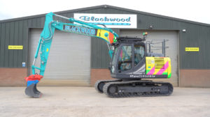 Kobelco SK130 which showcases the colours of the Lighthouse Construction Industry Charity’s recently launched Make It Visible campaign. 